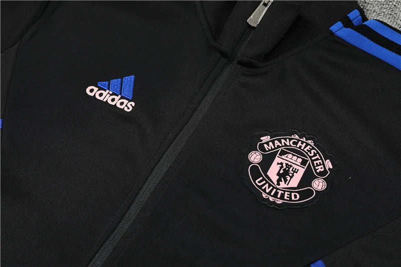 Survêtement Manchester United Noir/rose 2023/24
