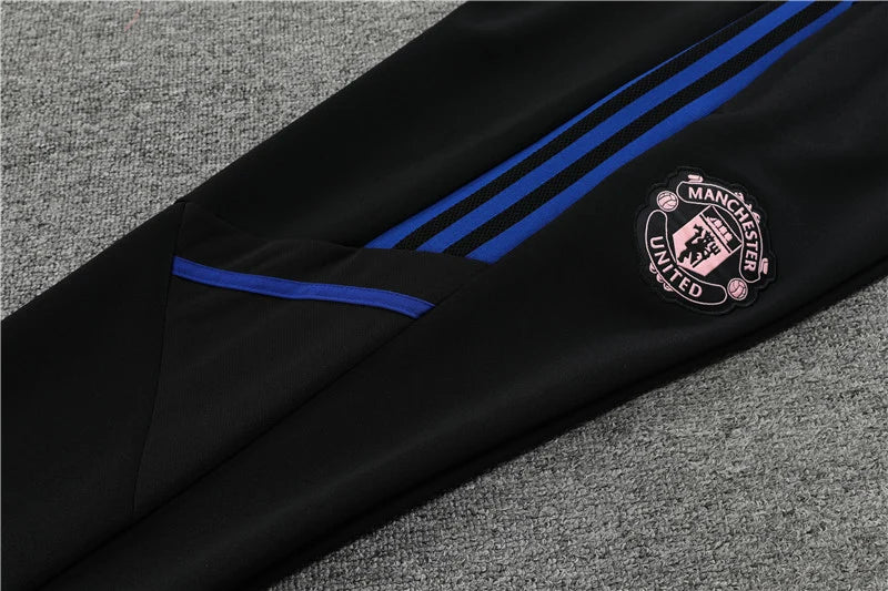 Survêtement Manchester United Noir/rose 2023/24