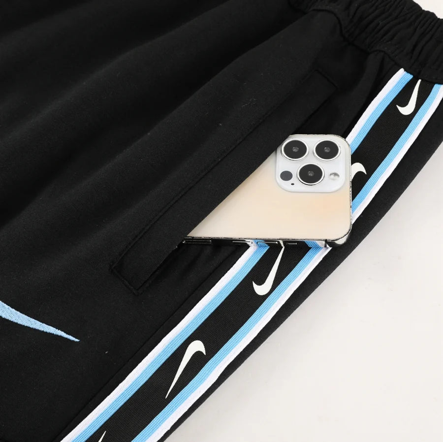 Survêtement jogging Nike Repeat logo bleu clair