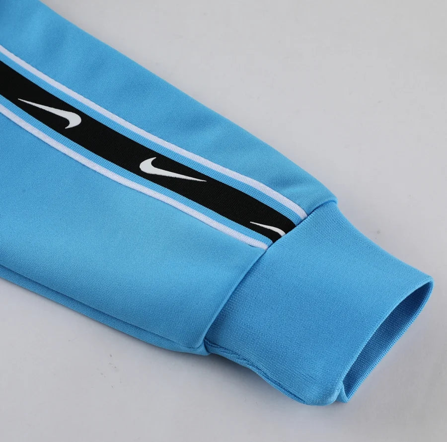 Survêtement jogging Nike Repeat logo bleu clair