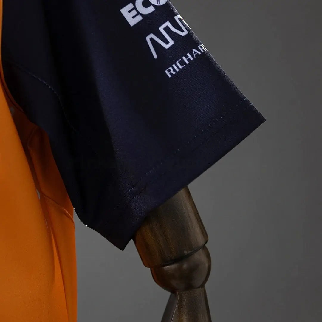 Polo Équipe Formula 1 2025 Orange et Noir