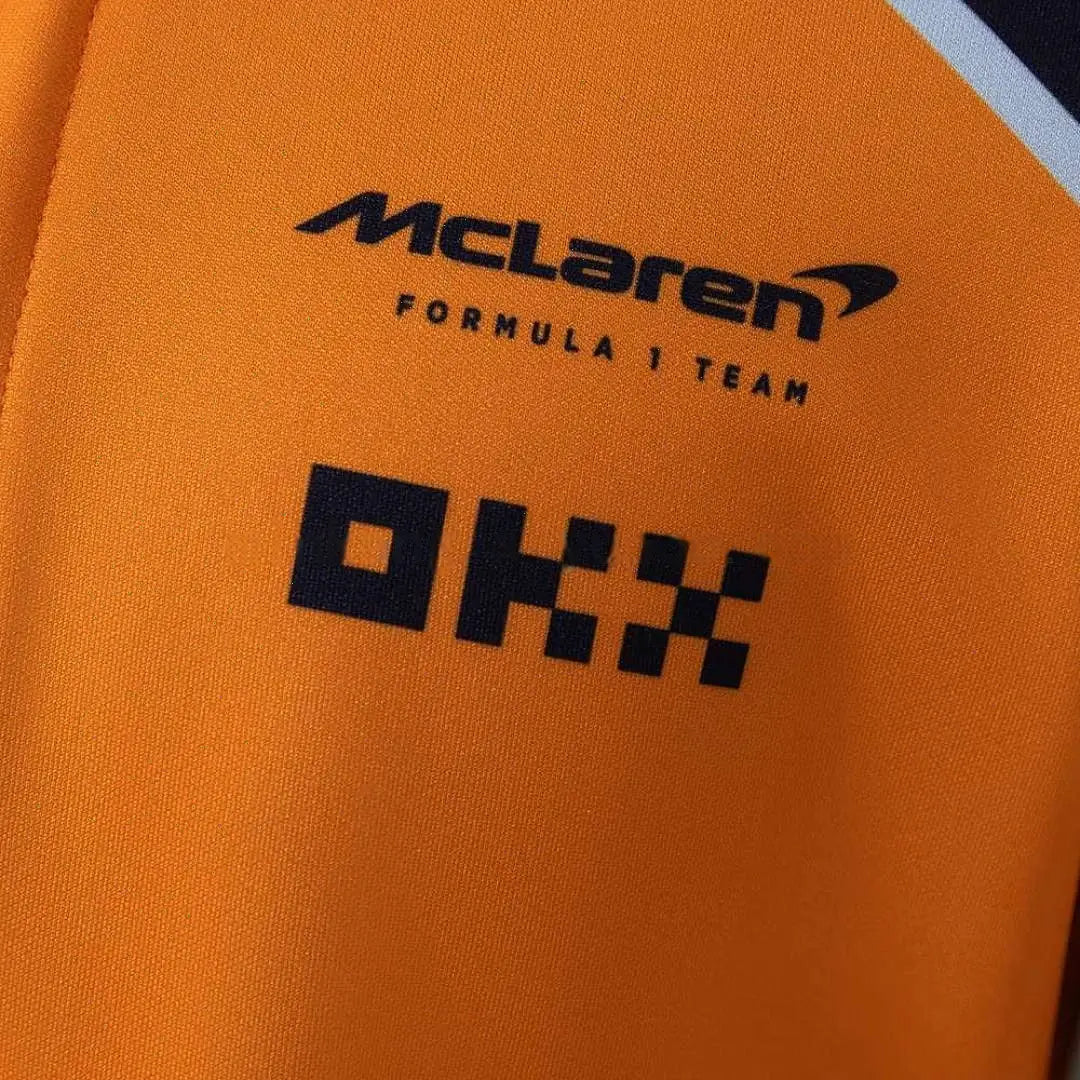 Polo Équipe Formula 1 2025 Orange et Noir