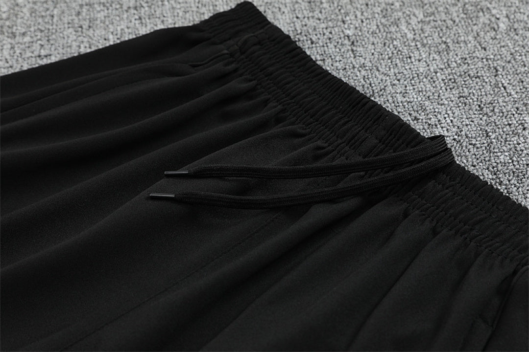 Survêtement Ensemble Jogging Manchester United Noir 2025/26 - Adult