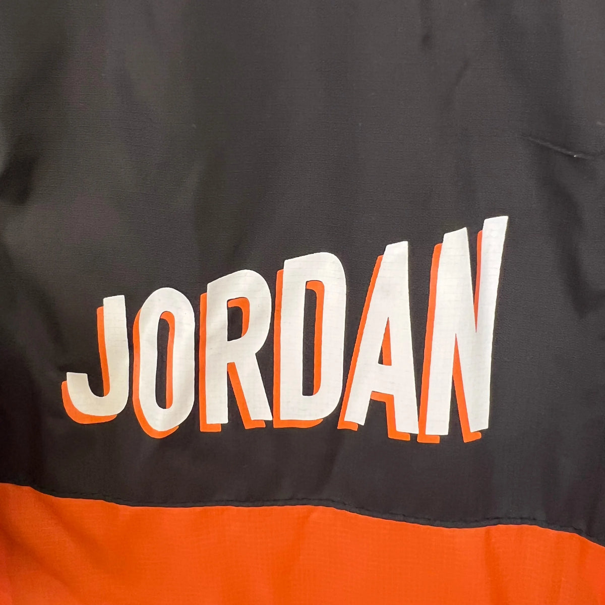 Veste coupe-vent Jordan noir/rouge 2023/24