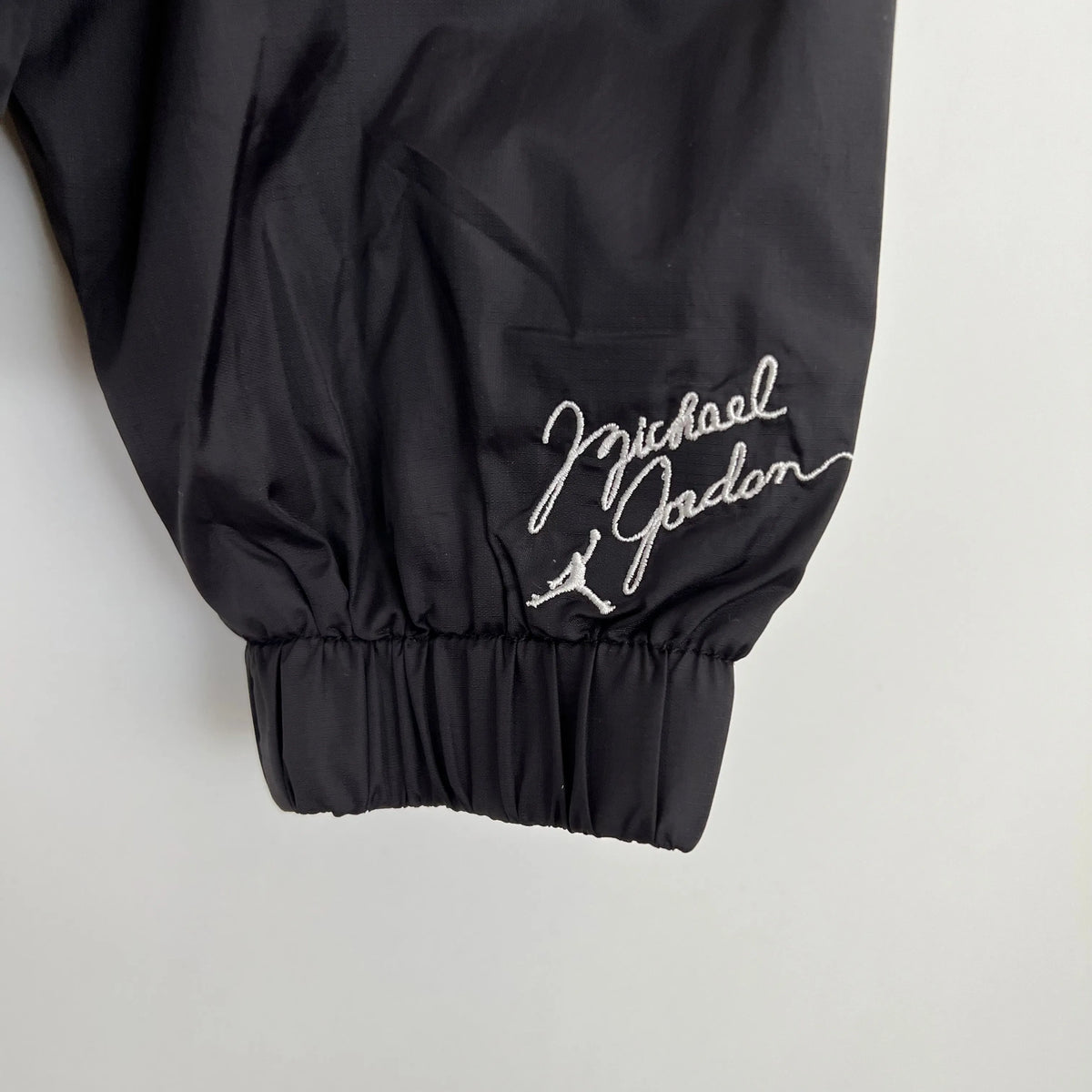 Veste coupe-vent Jordan noir/rouge 2023/24