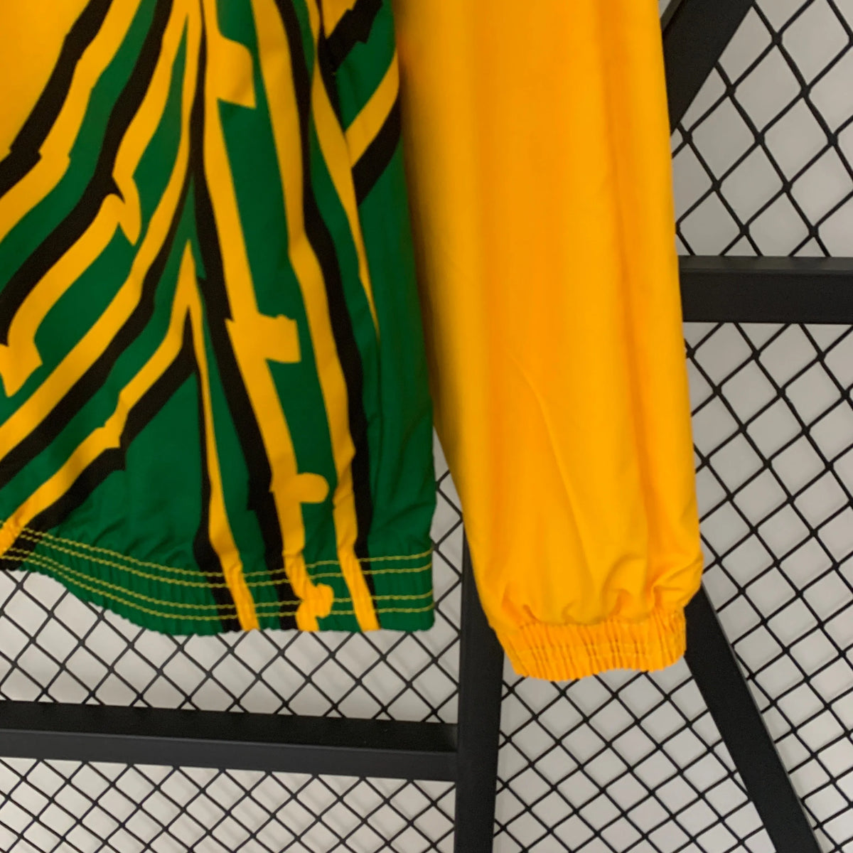 Veste coupe-vent réversible Jamaïque/Jamaica orange/vert 2023/24